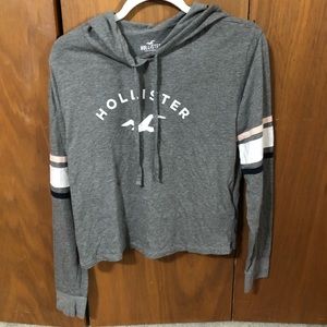 Grey long sleeve cropped Hollister shirt